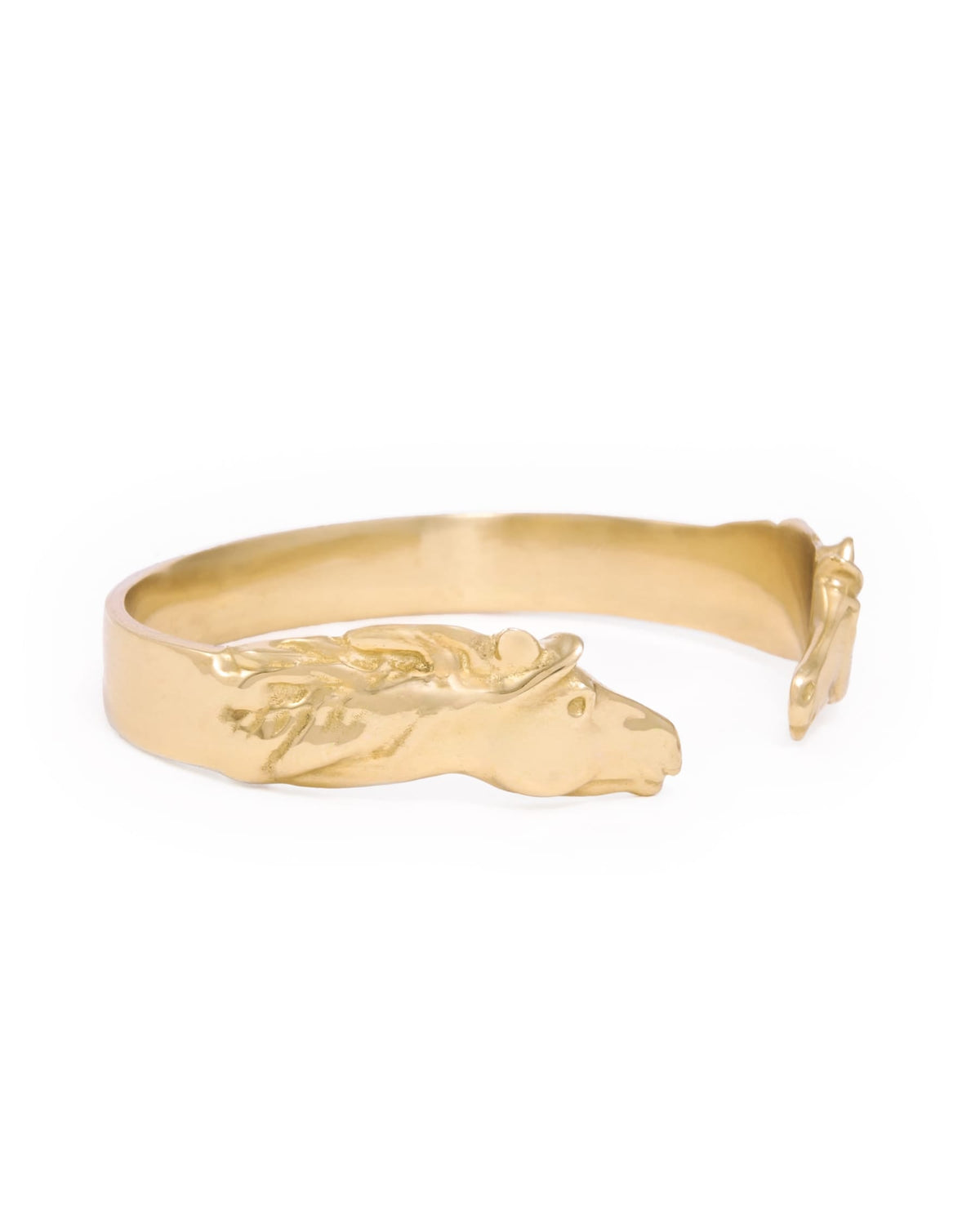 Gold-tone horse cuff bracelet with raised horse profile and open clasp