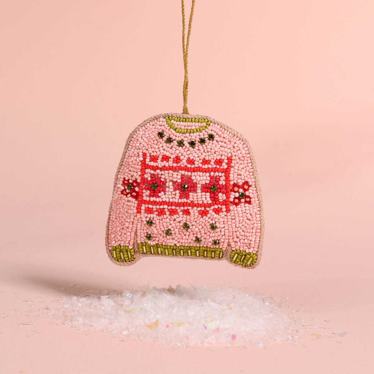 Beaded Christmas sweater ornament, pink with red and green pattern, hanging gold cord