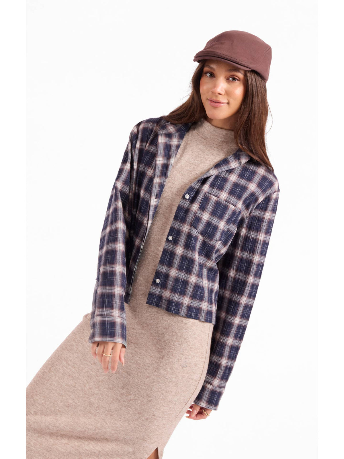 Navy and tan plaid button-up shirt with long sleeves and button front