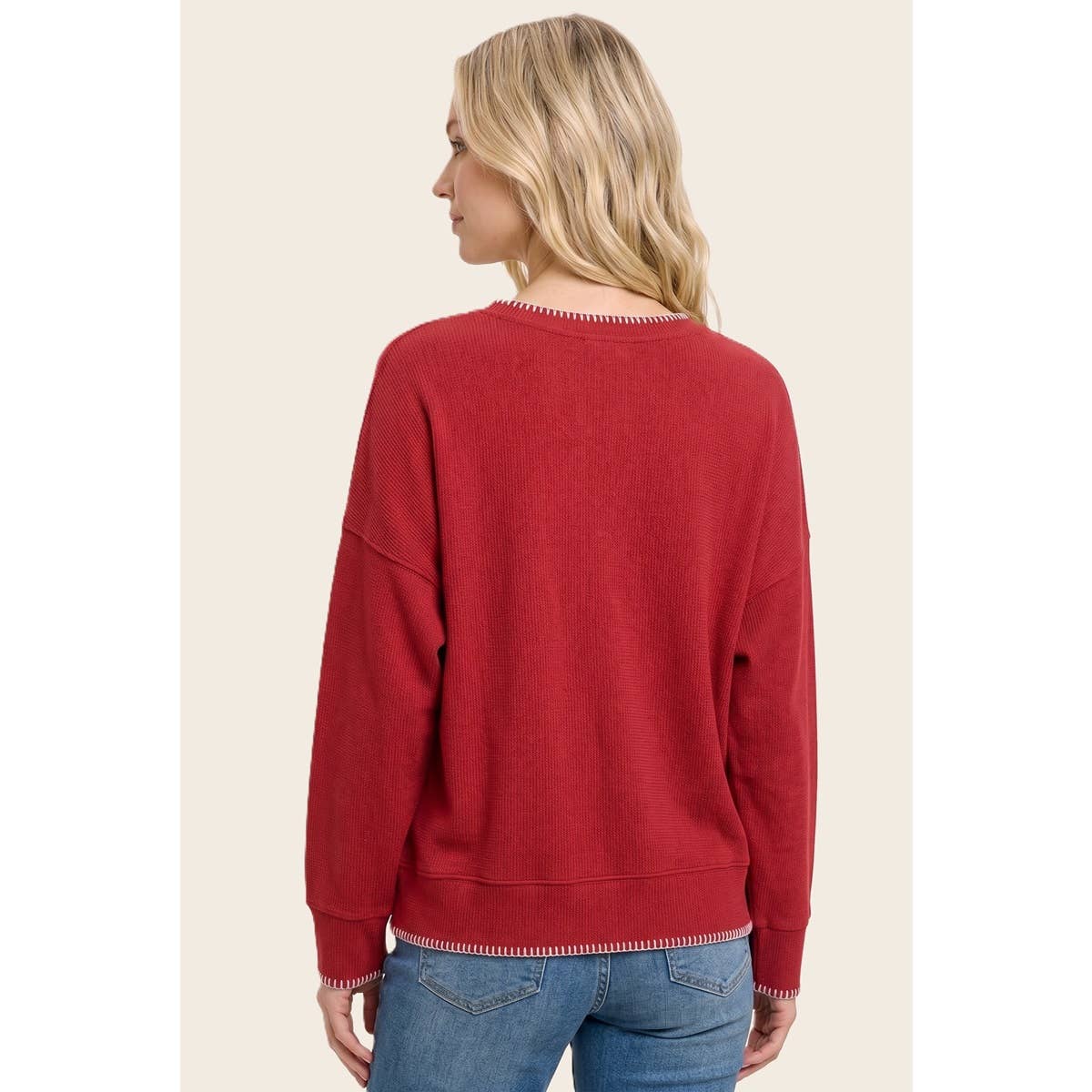 Women’s red stitched crewneck sweater, back view, ribbed cuffs and straight hem