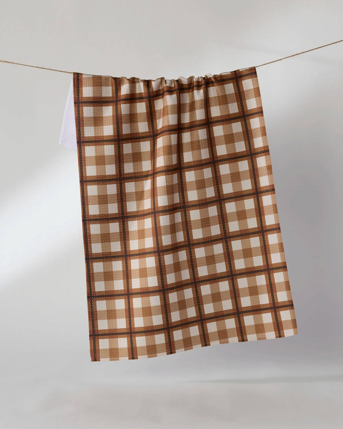Brown and cream plaid tea towel with gathered top and hanging loop
