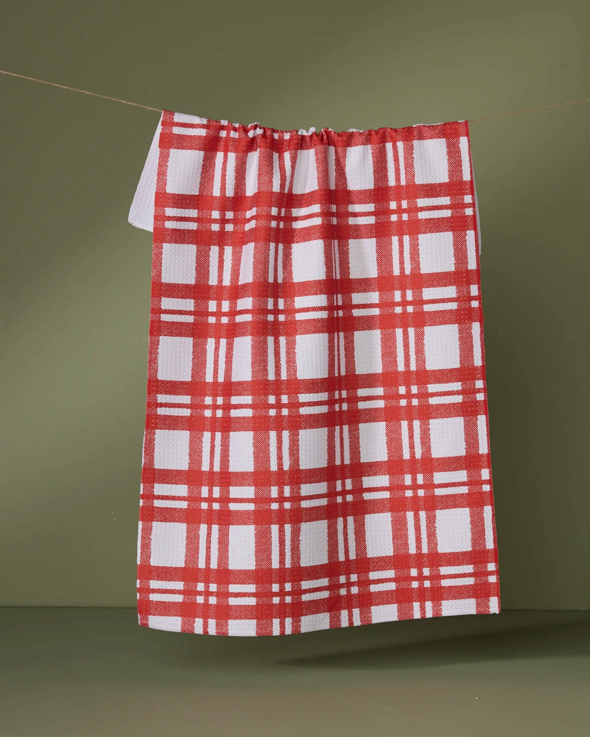 Red and white tartan tea towel with gathered top and hanging loop