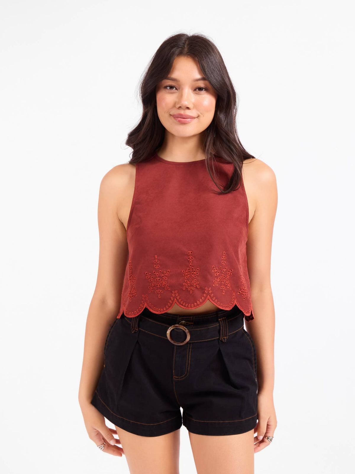 Sleeveless rust scallop-hem top with eyelet lace panel at the bottom