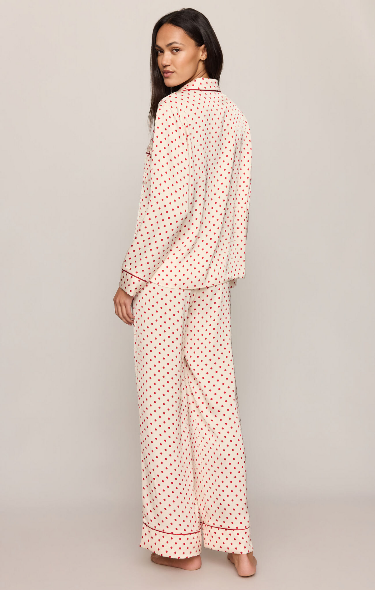 Two-piece pajama set, pink dot print button-front top and wide-leg pants, back view